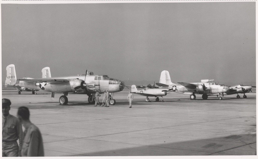 From left to right, B-25 Mitchell, Bell XP-77, Douglas A-20 and Beech C-45 parked on the Hunter Air Force Base flight line during WWII.  (Photo courtesy Mighty Eighth Air Force Museum)