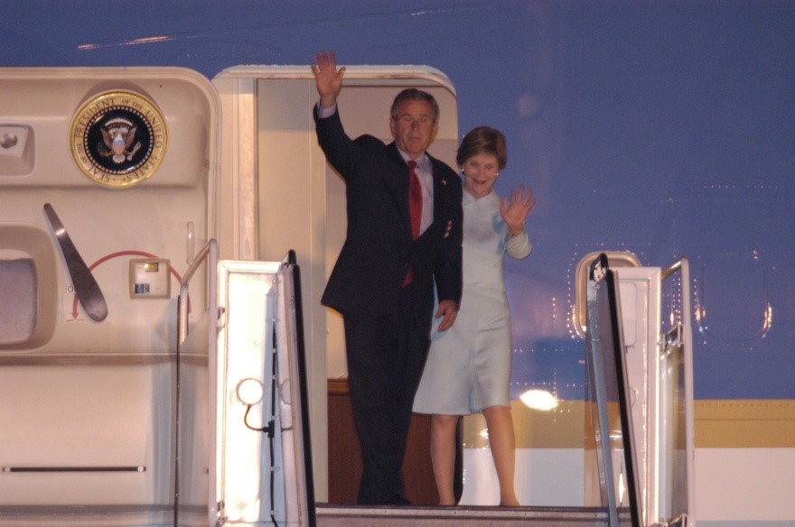 President George W. Bush, and wife Laura, arrive at Hunter Army Airfield in 2004 to attend the G-8 World Summit at Sea Island, GA. June 6-10.