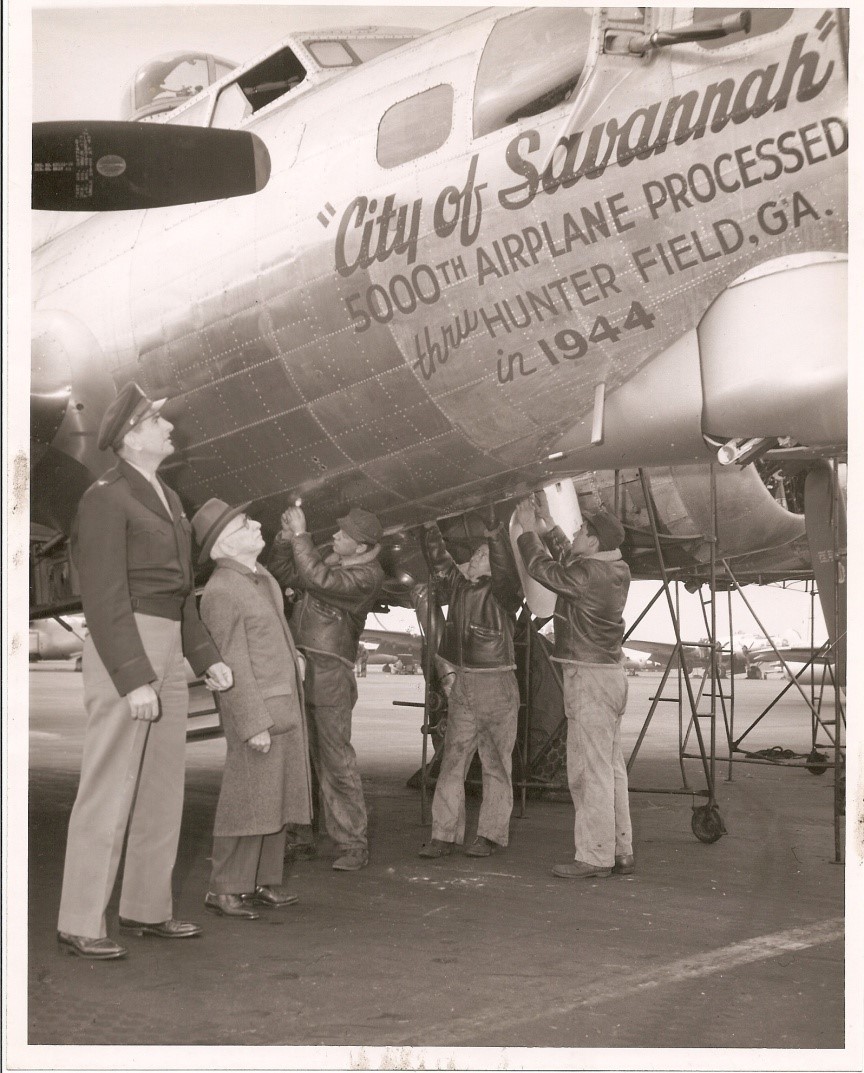 Brig. Gen. James Fitzmaurice (a colonel at the time) stands with Savannah Mayor Thomas Gamble, examining a plane at the City of Savannah Airport in 1945.