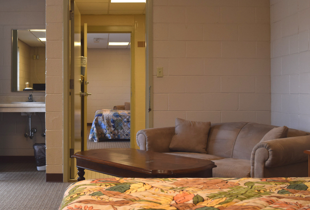 Shared bathrooms are locked with keys for upmost security. If you're traveling with a large family, an adjoining room is perfect! Joined room.jpg