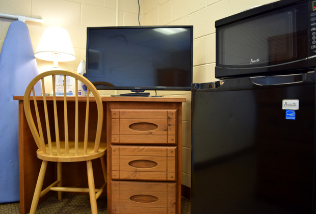 Desks, TV's, microwaves, and refrigerators make short-term and long-term stays easier. Desk.jpg